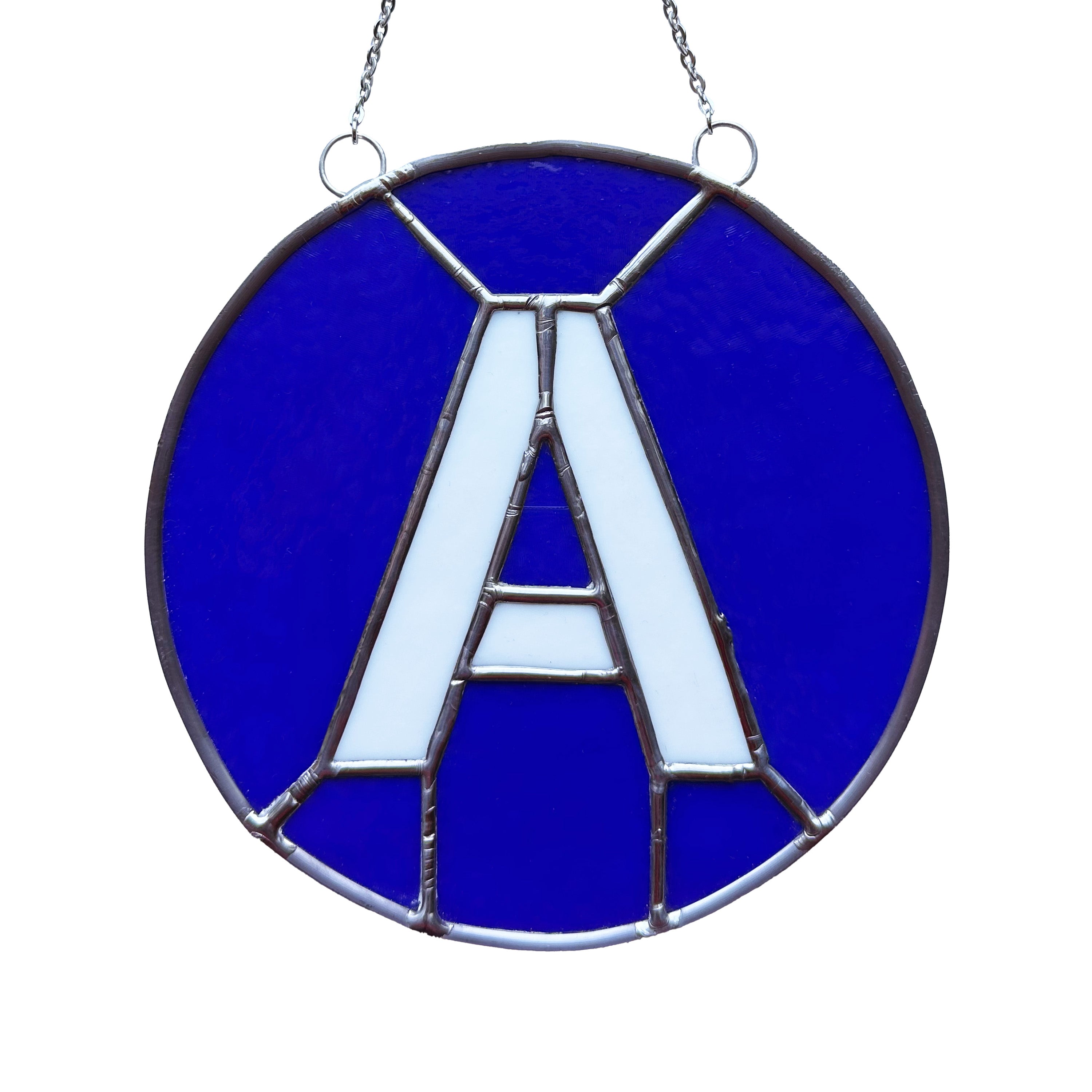 A Train Glass Medallion