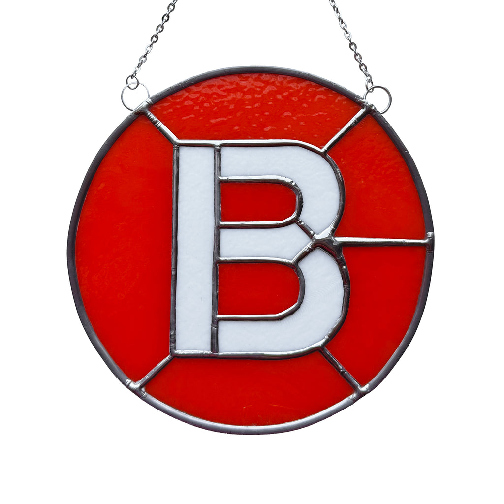 B Train Glass Medallion