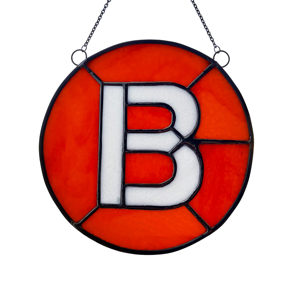 B Train Glass Medallion