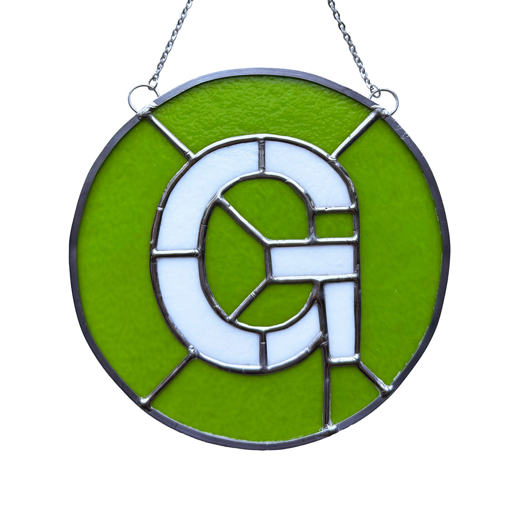 G Train Glass Medallion