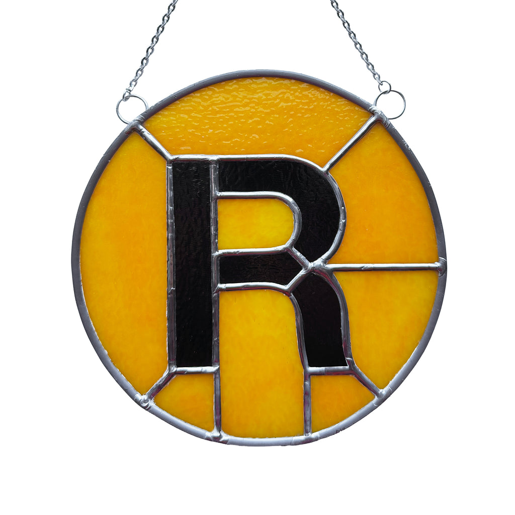 R Train Glass Medallion